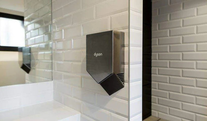 Dyson HU02 Airblade V hand dryer installed in commercial restroom